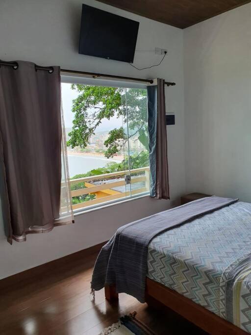 Por De Sol No Mar Da Cama Villa คารากัวตาตูบา ภายนอก รูปภาพ