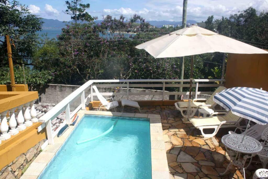 Por De Sol No Mar Da Cama Villa คารากัวตาตูบา ภายนอก รูปภาพ